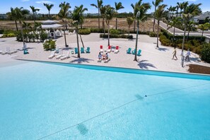 A heated pool - AQUA: Huge Lagoon Resort Pool, Outdoor Oasis by Anna Maria Life Vacation Rentals (Bradenton)