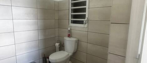 Hair dryer, towels, soap, toilet paper