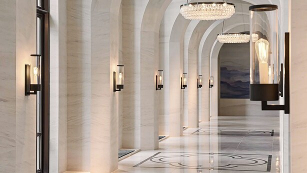 A modern hotel lobby with arched ceilings, chandeliers, and a marble floor. - Taj Palace, Lucknow (Lucknow)