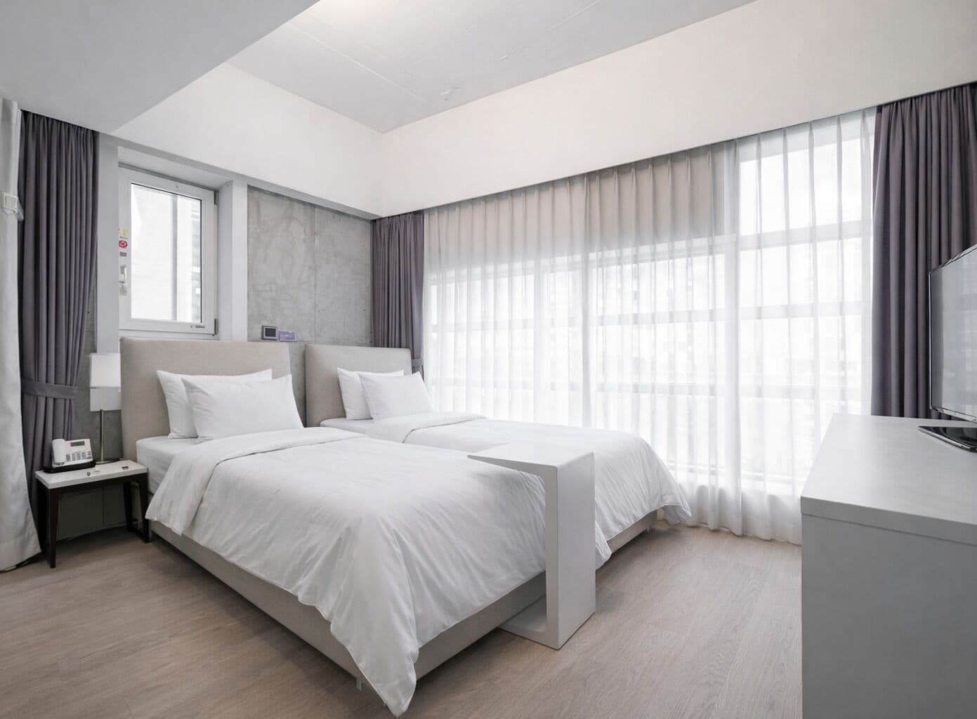 Habitación Deluxe con 2 camas individuales | Wifi gratis y ropa de cama 