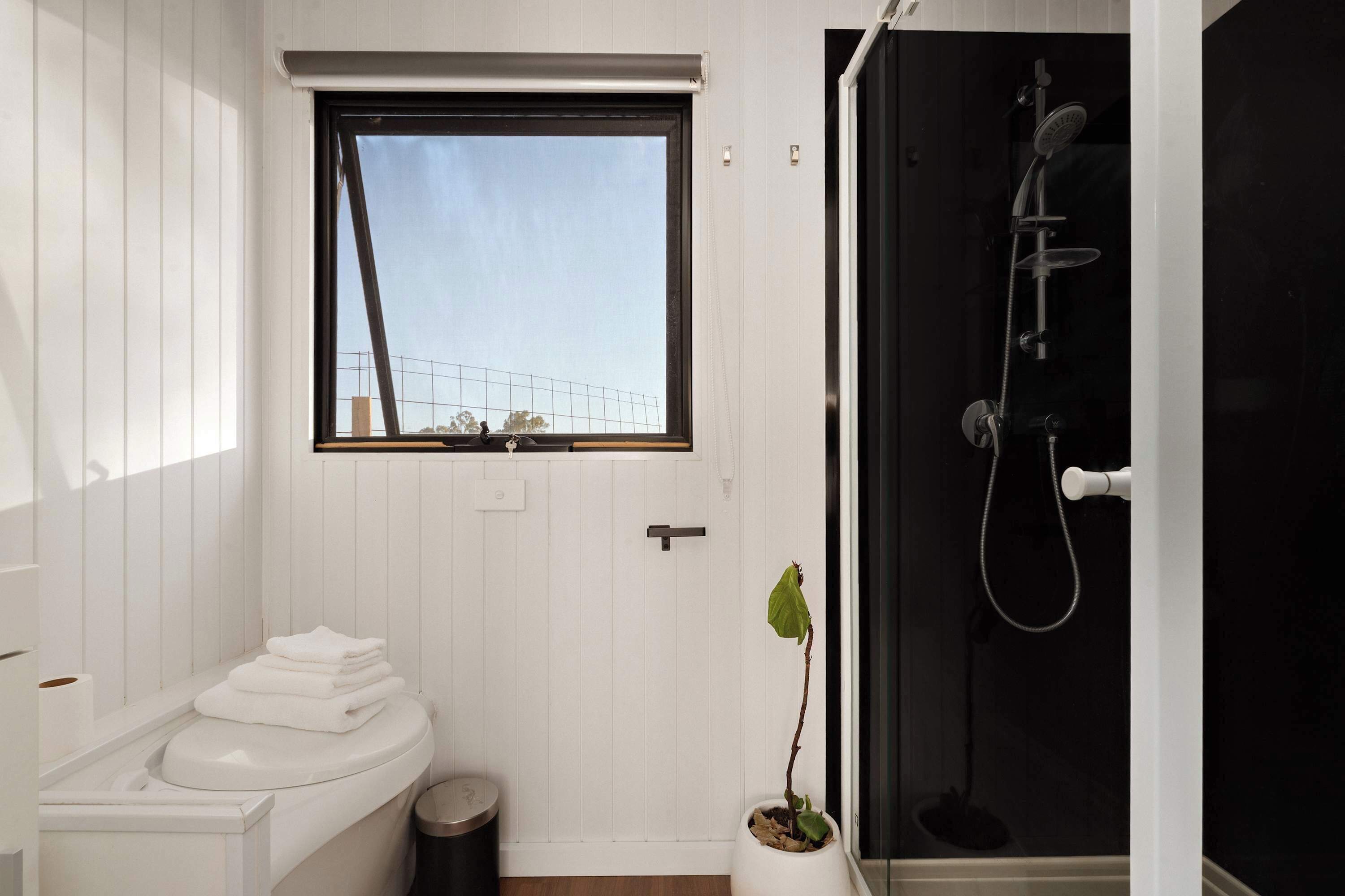 Shower, hair dryer, towels, shampoo