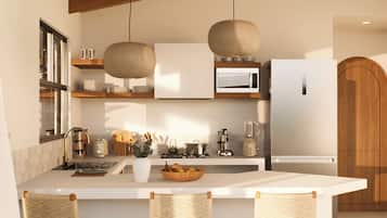 Full-sized fridge, stovetop, cookware/dishes/utensils