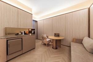 Family Twin Room, City View | Living area | TV, printers
