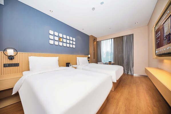 A hotel room with two beds, a wooden headboard, a wall-mounted TV, and a large window with curtains. - Crystal Hotel Shanghai The Bund Yu Garden (Shanghai)
