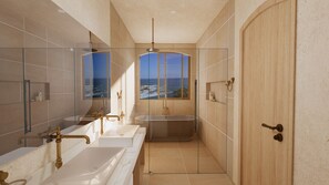Suite Junior (Suite Pluton) | Salle de bain | Baignoire et douche séparées, séchoir à cheveux, peignoirs