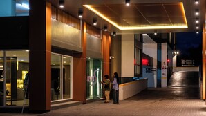 A hotel lobby with a prominent 'Lobby' sign, a reception desk, and a staircase leading to an upper level. - River Hotel Hatyai (Hat Yai)