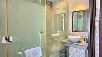 Shower, free toiletries, hair dryer, slippers