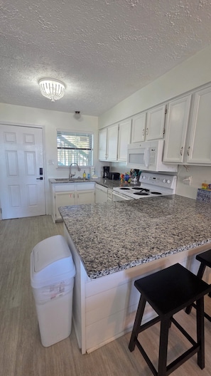 Fridge, microwave, oven, stovetop - Lani kai unit 111. Cozy 2bed-2bath condo with beach access. PRIME LOCATION (Gulf Shores)