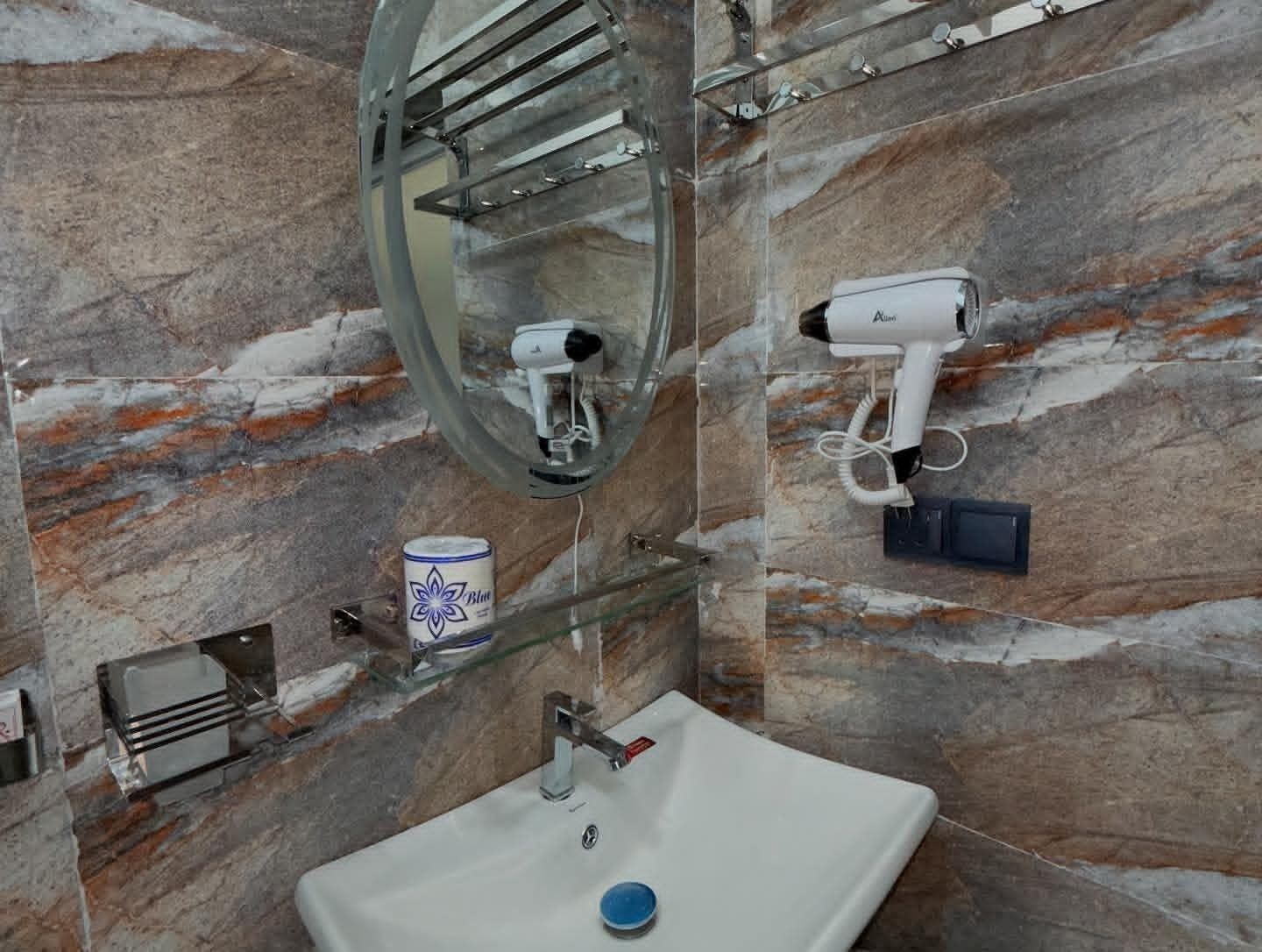 Separate bathtub and shower, free toiletries, hair dryer, heated floors