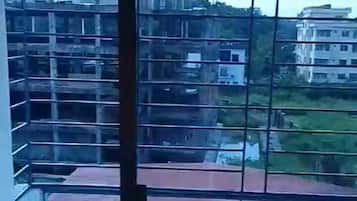 Familienapartment, Balkon, Gartenblick | Wohnbereich