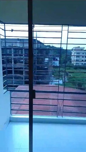 Familienapartment, Balkon, Gartenblick | Wohnbereich