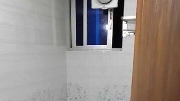 Shower, towels, soap, shampoo