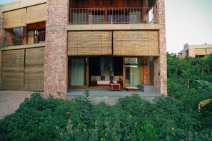 Deluxe Suite, Patio, Pool View | Exterior - kizikula (Kizimkazi)