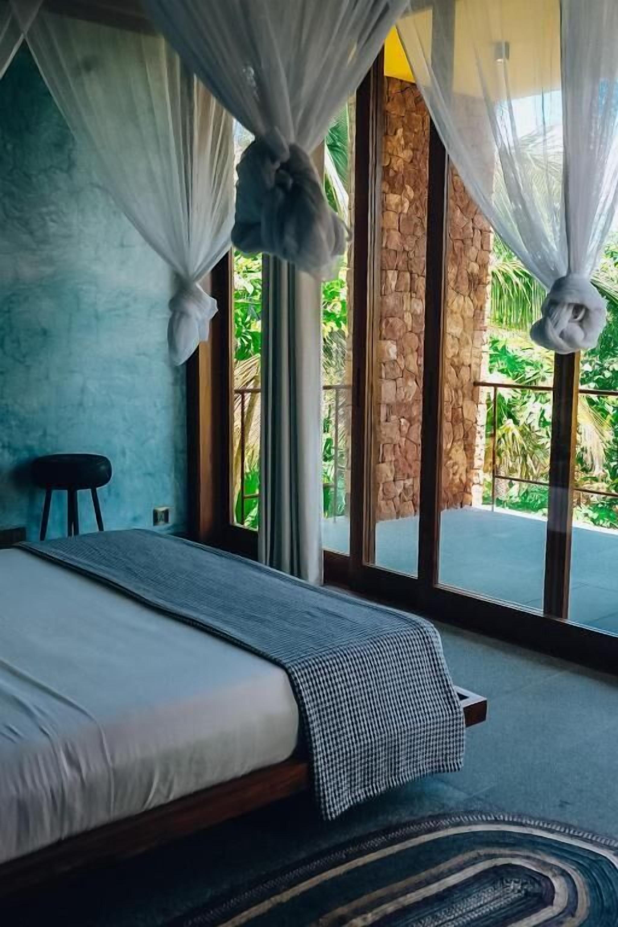 Deluxe tweepersoonskamer, balkon, uitzicht op oceaan | Een kluis op de kamer, gratis wifi