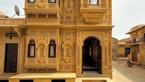 A traditional building with intricate architectural details, multiple balconies, and a central entrance. - Mayra Boutique Casa (Jaisalmer)