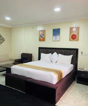 Deluxe Room, Balcony, City View | Desk, laptop workspace, blackout drapes, soundproofing - New Benny Rose   (Abuja)