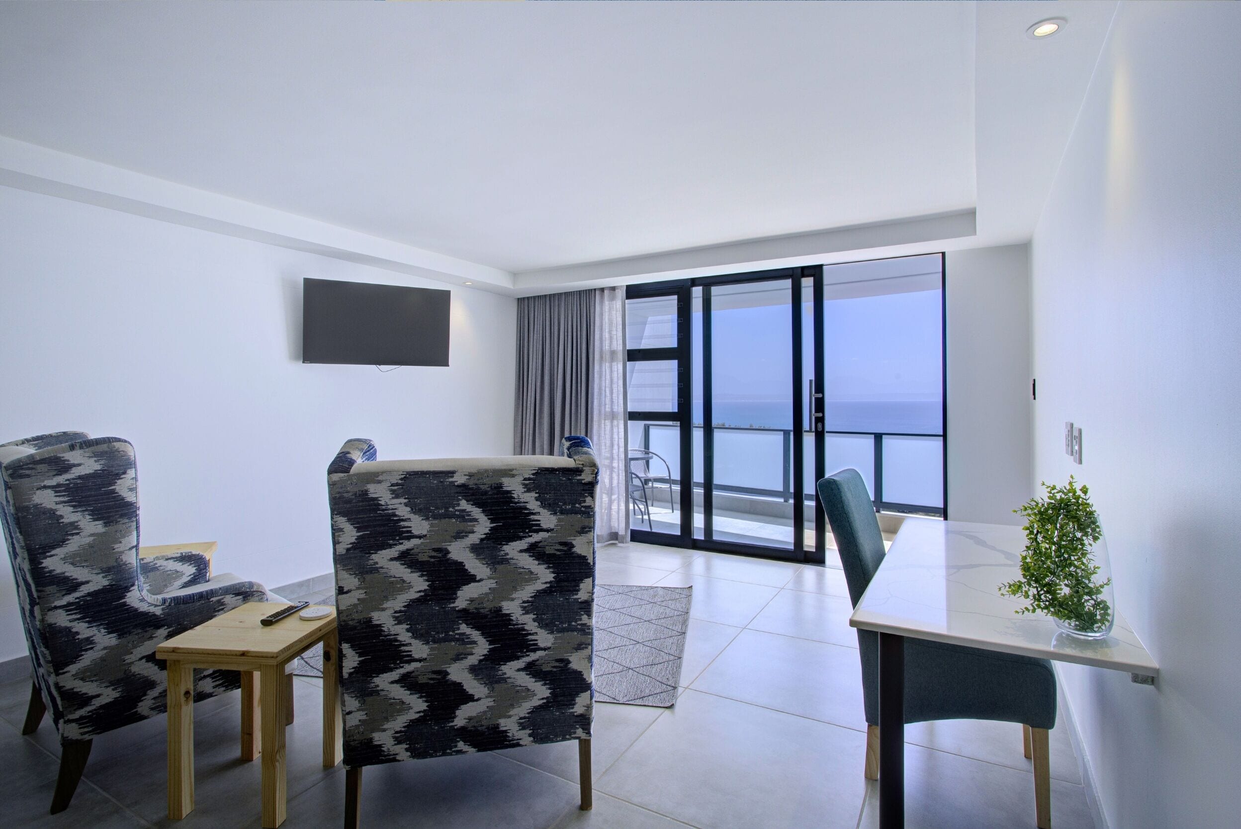 Executive suite, uitzicht op zee | Woonruimte