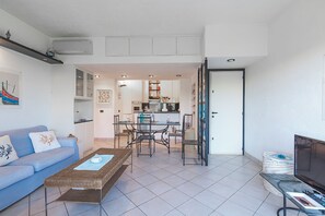 Family Apartment, Multiple Bedrooms, 2 Bathrooms (Il Vecchio Faro 66) | Living area - Il Vecchio Faro 66 (Loiri Porto San Paolo)