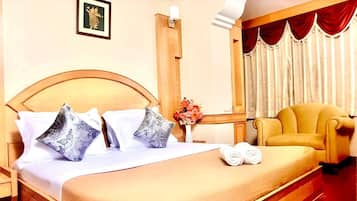 Premium bedding, memory-foam beds, desk, laptop workspace