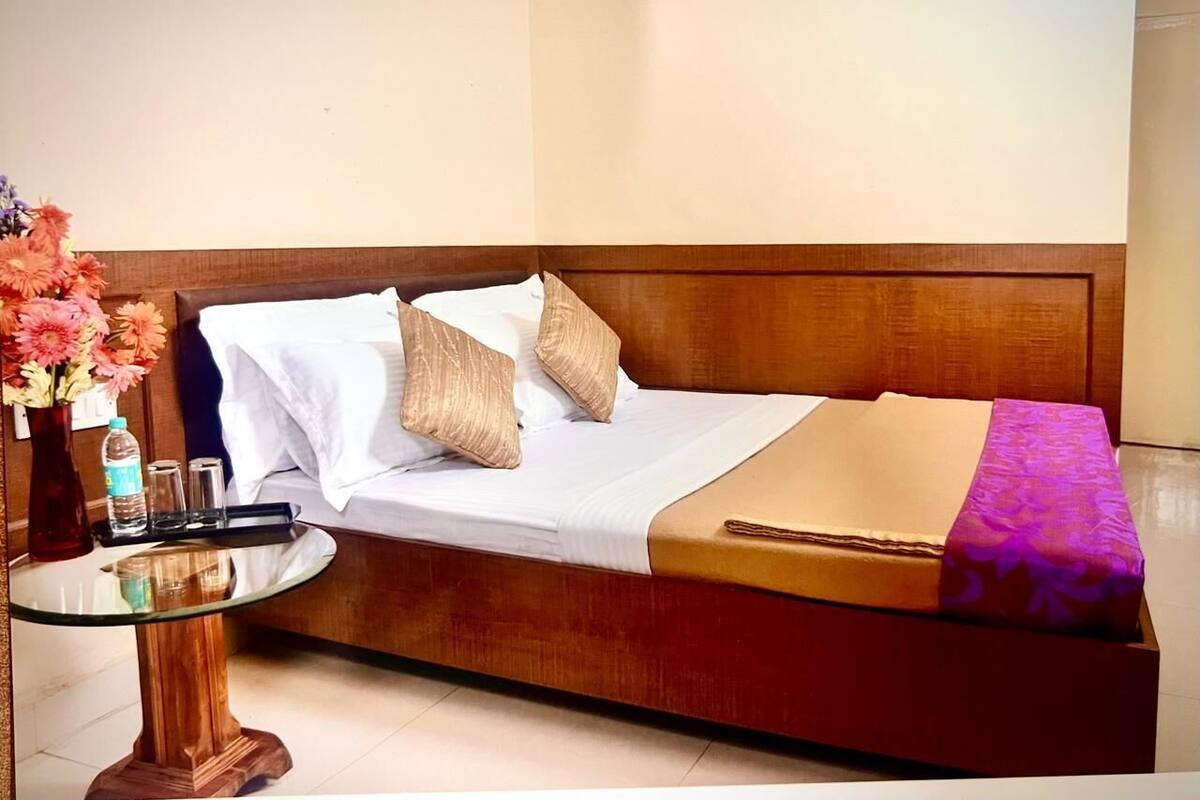 Premium bedding, memory foam beds, desk, laptop workspace