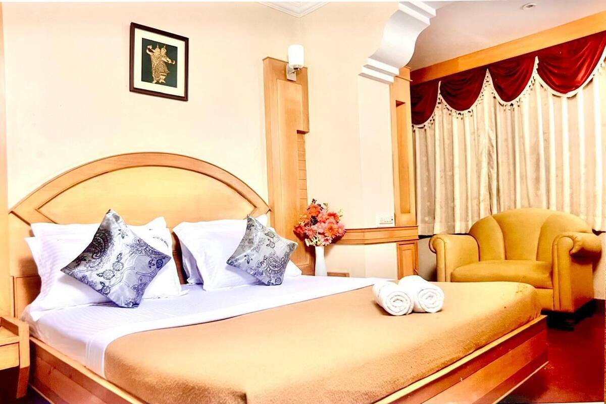 Premium bedding, memory foam beds, desk, laptop workspace