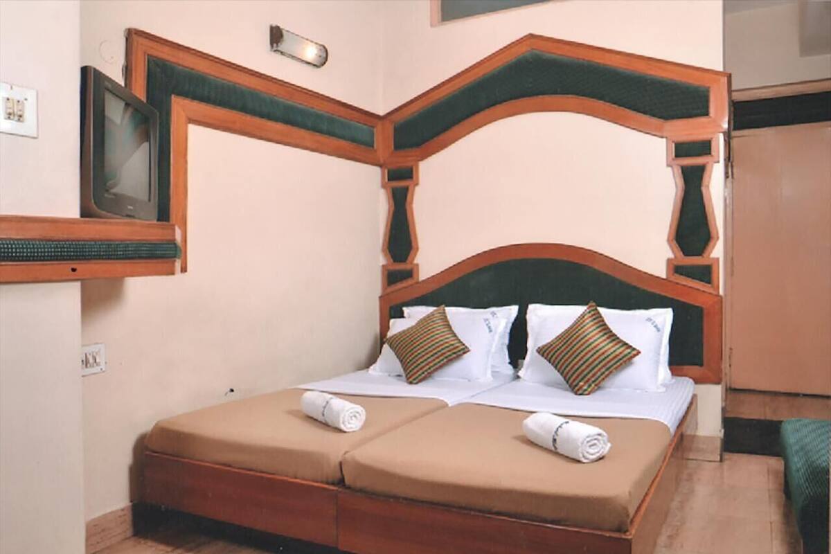 Premium bedding, memory foam beds, desk, laptop workspace