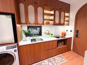 Apartment, City View | Private kitchen | Mini-fridge, microwave, cookware/dishes/utensils - GAIA House Le Duan (Hanoi)