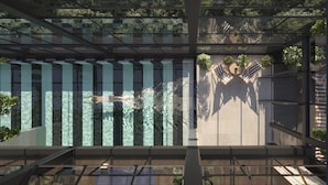 A modern building with a glass facade and a view of greenery outside. - The Queensbridge Skyline Suite, Heated Pool, Gym, Sauna, Steam next to Casino (Southbank)