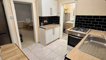 Fridge, microwave, cookware/dishes/utensils