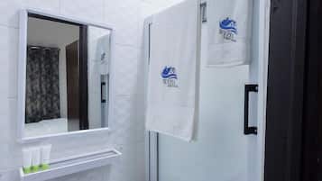 Comfort Room | Bathroom | Shower, free toiletries, slippers, towels