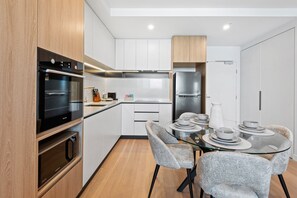 Fridge, microwave, oven, stovetop - Stunning 1-Bed with City Views and Amenities (Alphington)