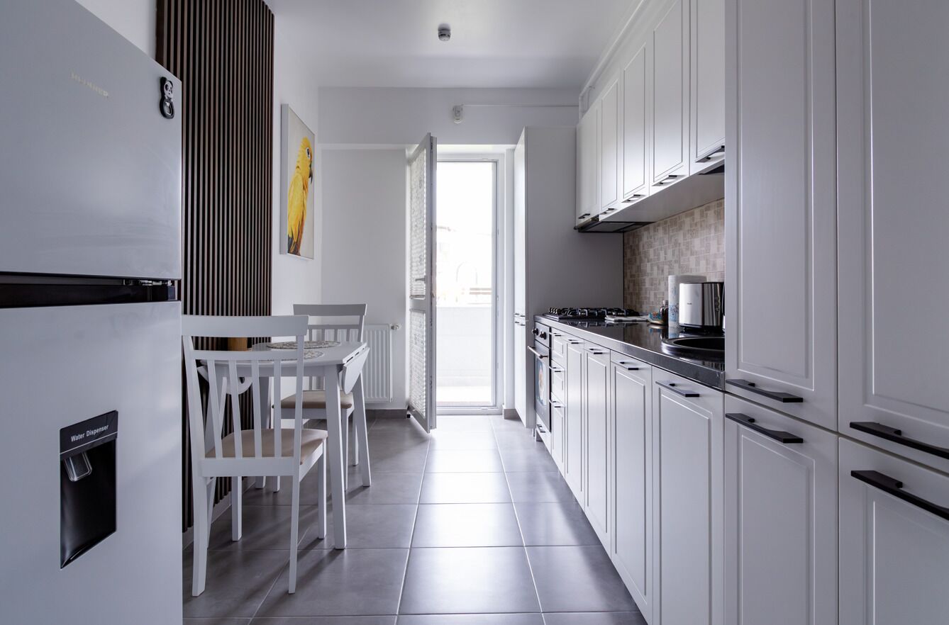 Apartamento, sacada, vista para a cidade | Cozinha privada