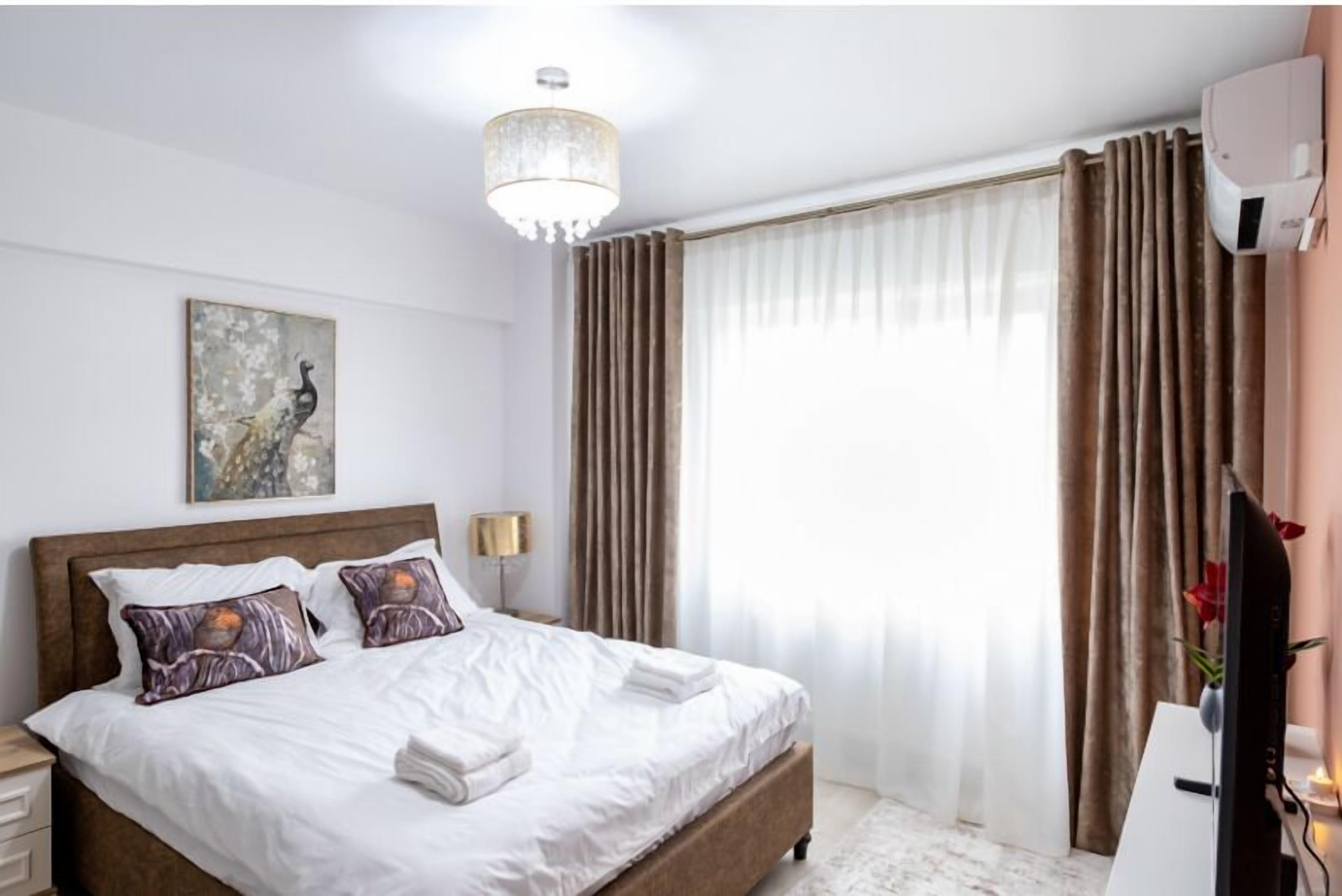 Apartment, Balcony, City View | Iron/ironing board, free WiFi