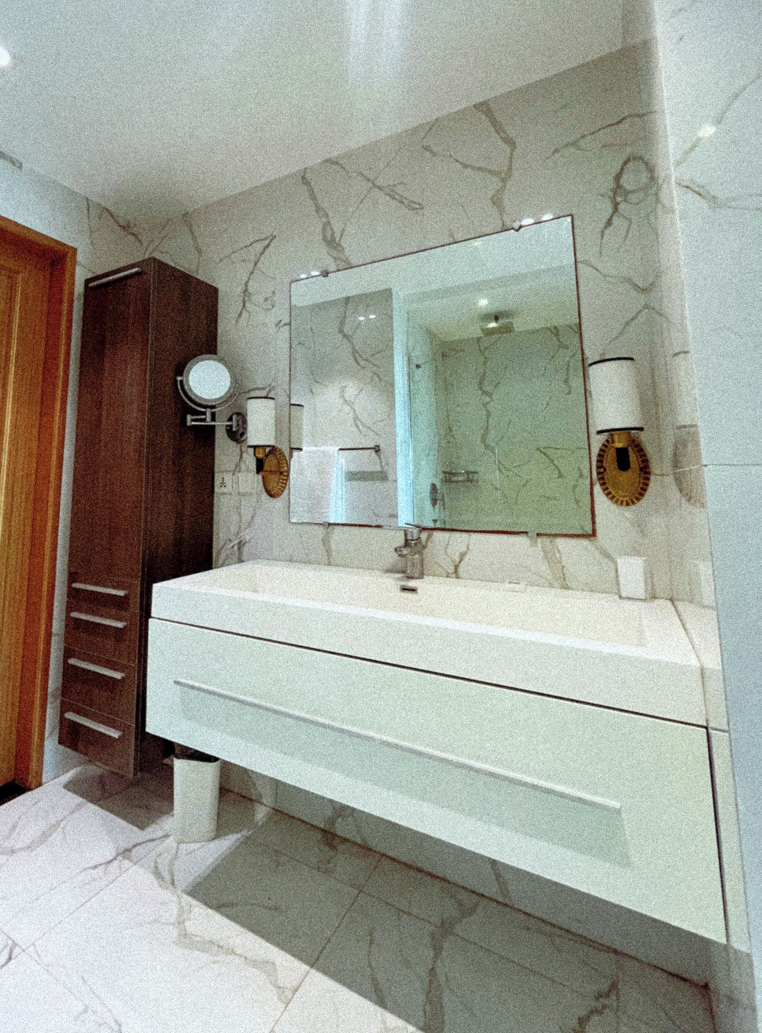 Hair dryer, towels, soap, toilet paper