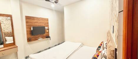 Premium bedding, desk, laptop workspace, free WiFi