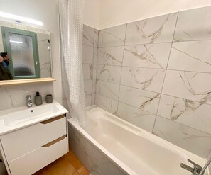 Hair dryer, towels, soap, toilet paper