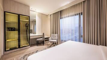 Suite Deluks | Seprai katun Mesir, seprai premium, busa memori, dan minibar