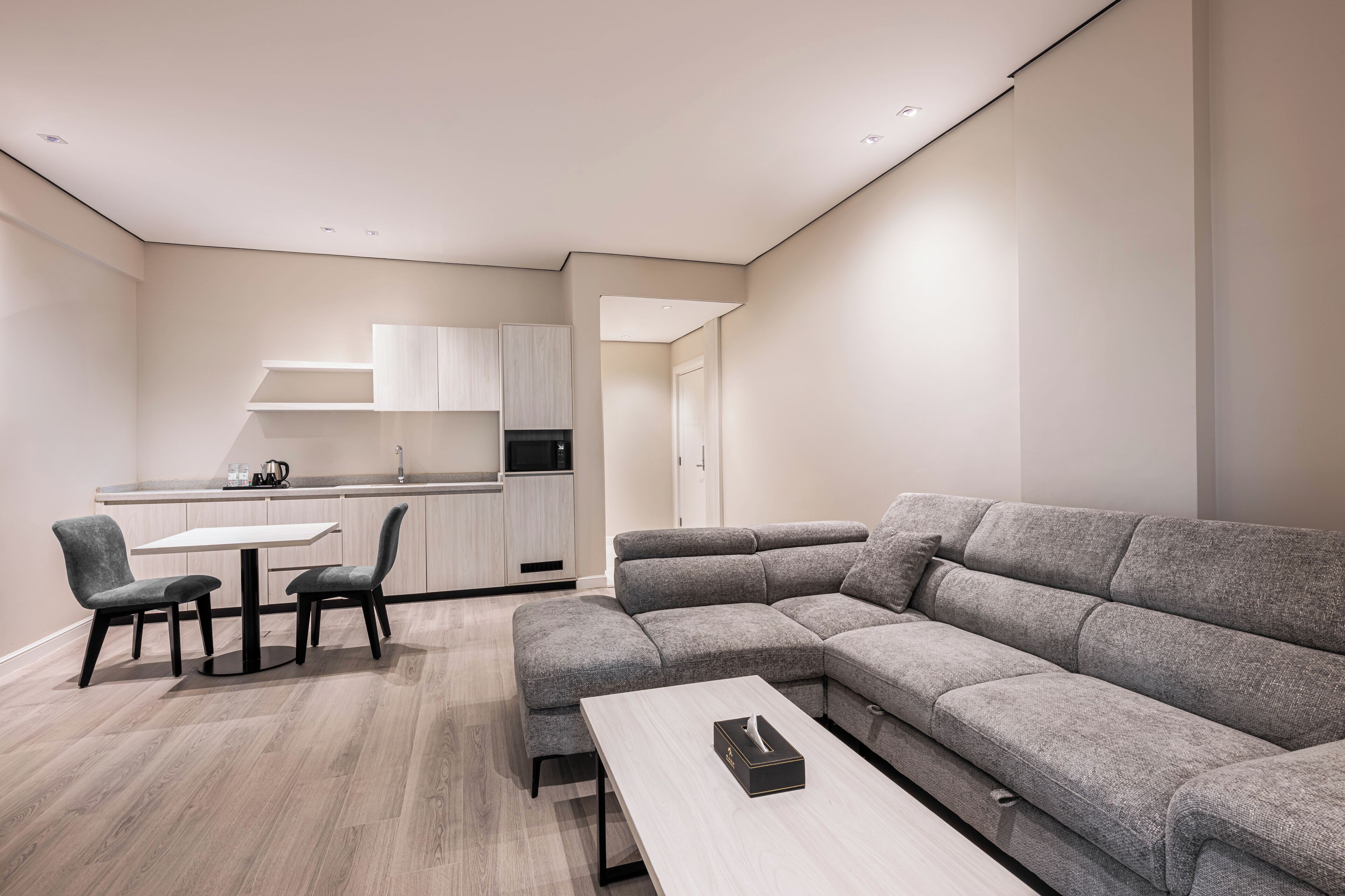 Exclusive Suite | Living area | 55-inch LCD TV with satellite channels, printers