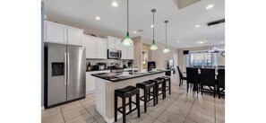Fridge, microwave, oven, stovetop - Spacious 7 BR Villa with Pool, Spa, Themed Rooms (Kissimmee)