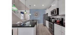 Fridge, microwave, oven, stovetop - Spacious 7 BR Villa with Pool, Spa, Themed Rooms (Kissimmee)