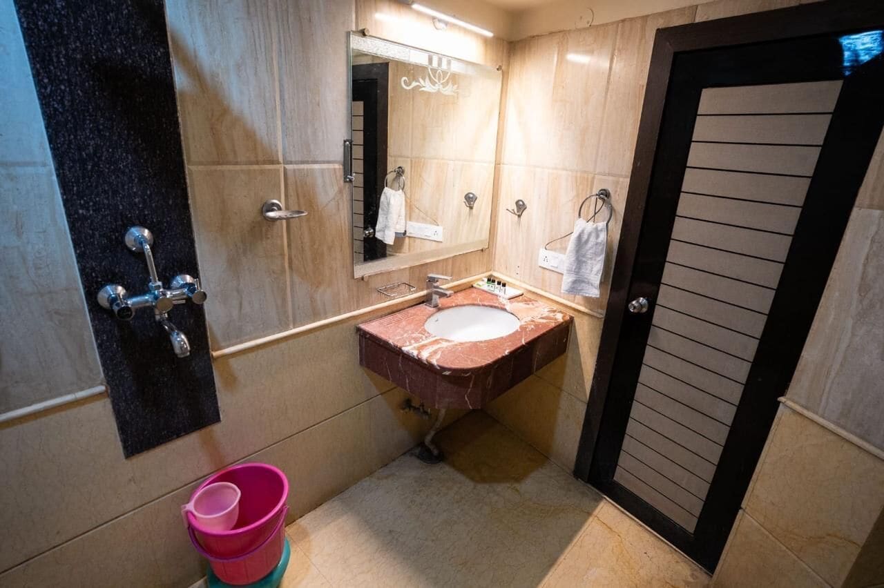 Shower, towels, soap, shampoo