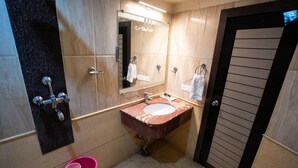 Shower, towels, soap, shampoo - JS Residency (Varanasi)