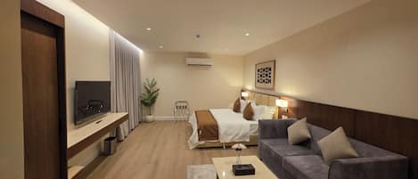 Coffres-forts dans les chambres, fer et planche à repasser