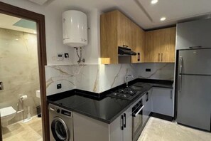 Private kitchen - Elegant 1 bedroom apartment in Marrakech - Comfort, quiet & free parking (Marrakech)