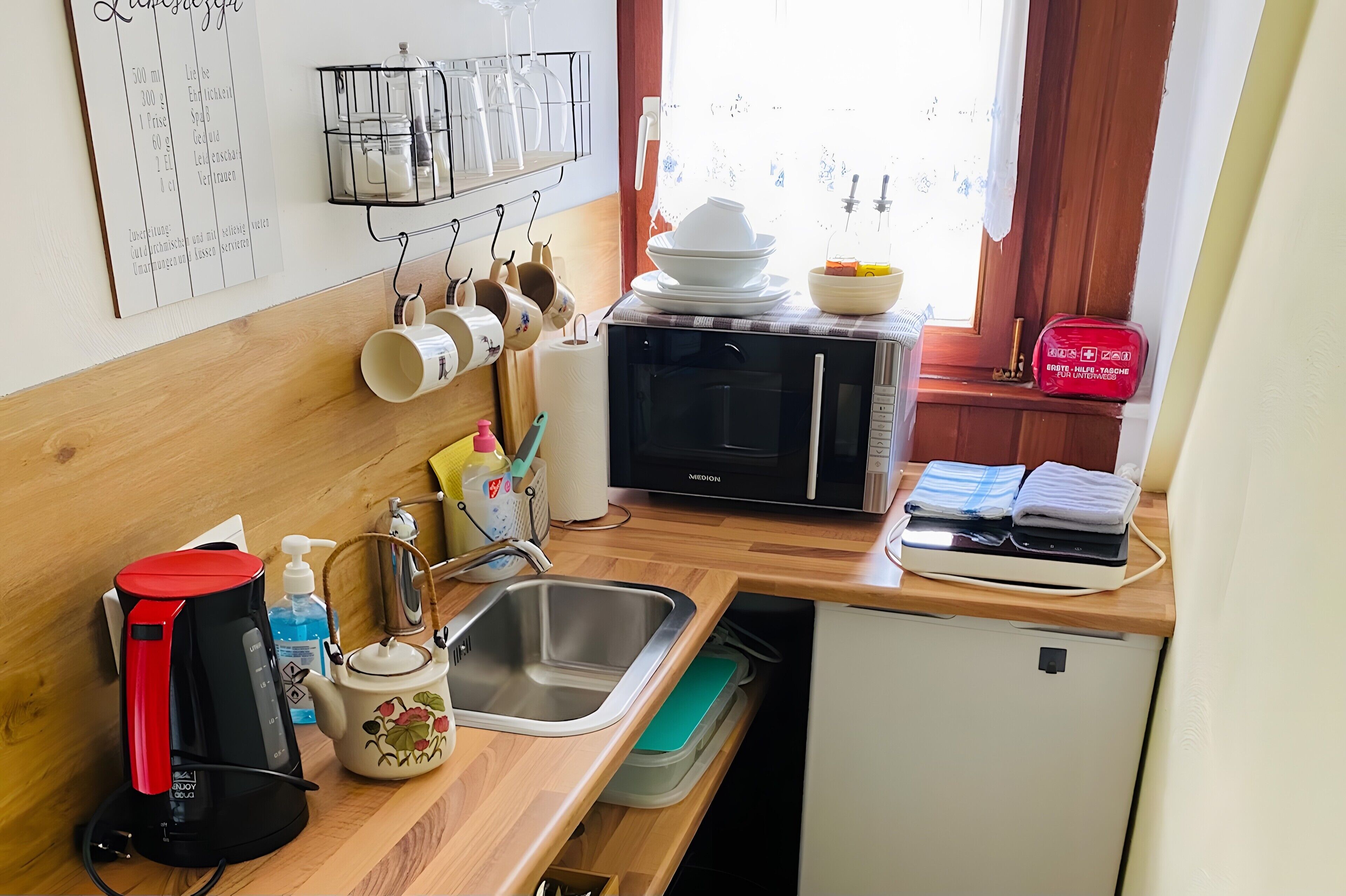 Fridge, microwave, stovetop, coffee/tea maker