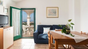 TV - Holiday Home 'Vacanze Con Vista A Tanaunella' with Sea View, Wi-Fi & Air Conditioning (Budoni)