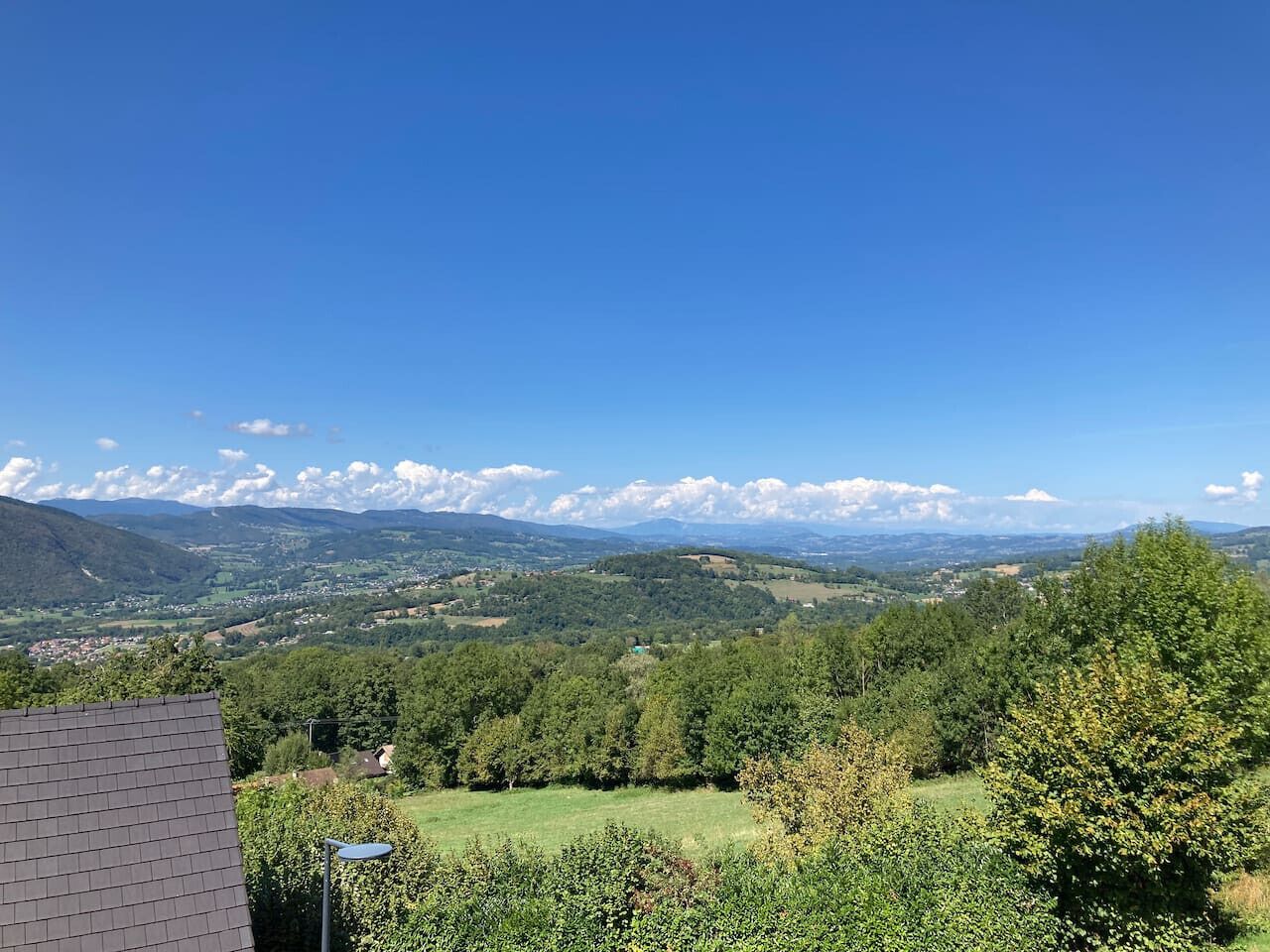 A view of a mountainous landscape with a clear sky.