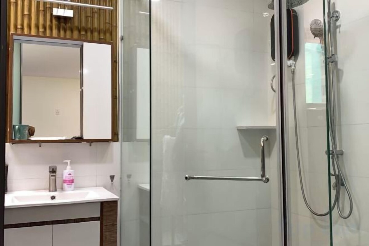 Hair dryer, slippers, towels, soap