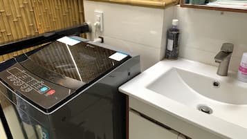 Family Room | Bathroom | Hair dryer, slippers, towels, soap