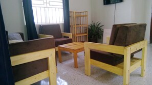 Deluxe Suite, River View | Living area - Gray Hideaway Resort (Kayunga)